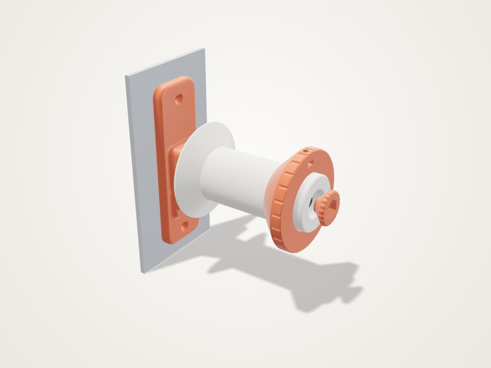 Wall spool holder with self-centring cones, a 3D printable design
