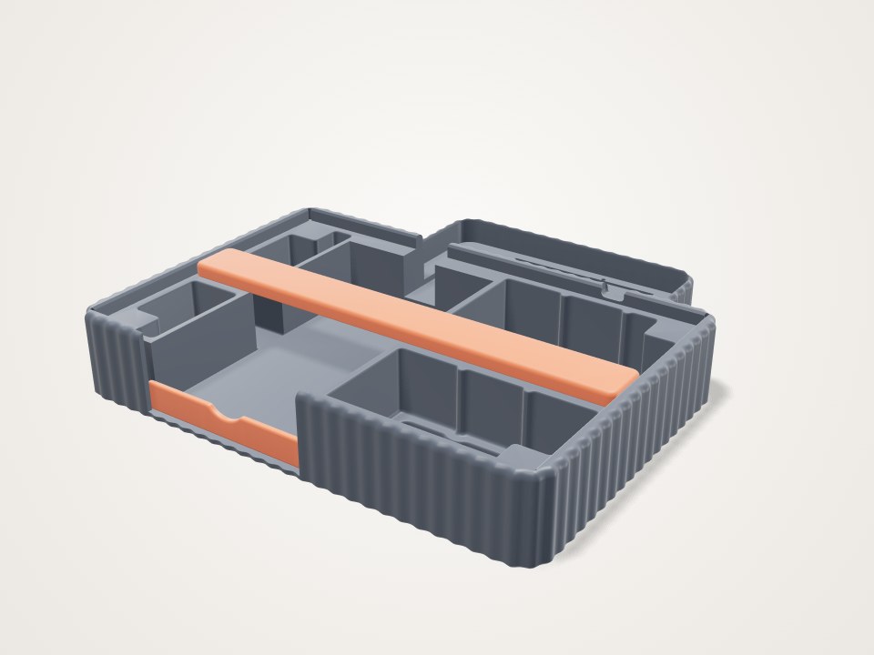 Grey tray with ribbed sides, small compartments, a power bank bay and an orange bar across the top