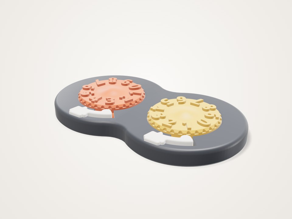 Dark peanut-shaped base holding two round numbered dials, one orange and one yellow, with white pointers