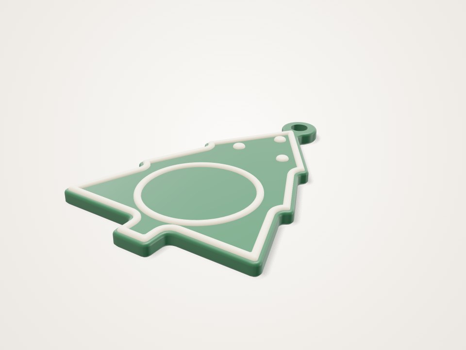 Flat green Christmas tree ornament with a raised white outline, a round tag circle and a hanger loop