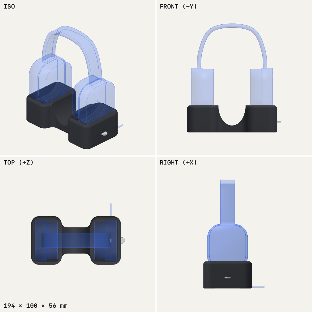 Dark two-pocket dock with a rounded scoop between, holding a pair of over-ear headphones upright