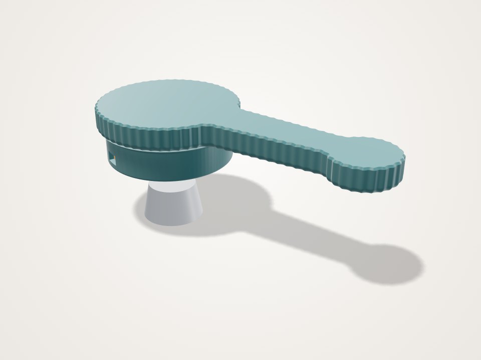 Teal round cap with a long flat arm and a small grey stem underneath, fluted around the edges